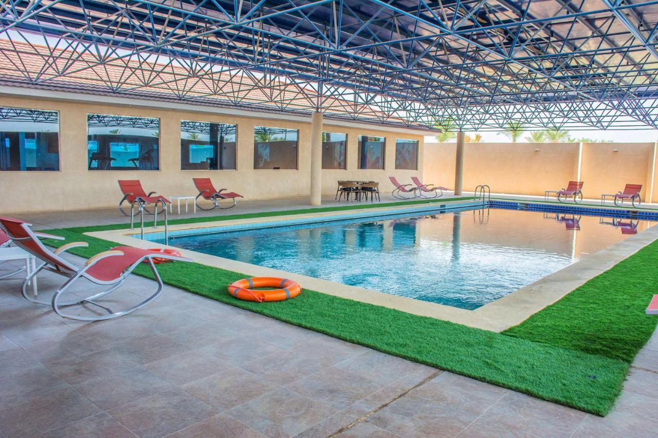 Radisson Blu Resort, Al Khobar ハーフ・ムーン・ベイ エクステリア 写真 Swimming pool at the hotel